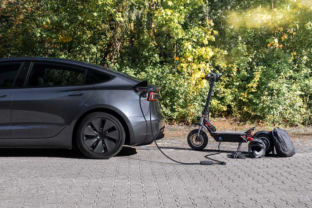 Tesla charging and e-scooter