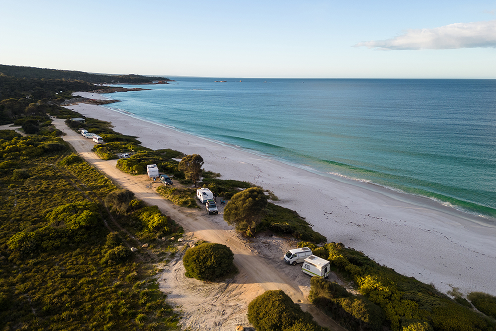 Caravans at Bay of Fires Beach in Tasmania.