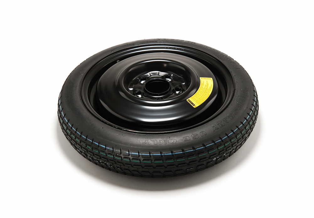 Space-saver spare tyre for a car.