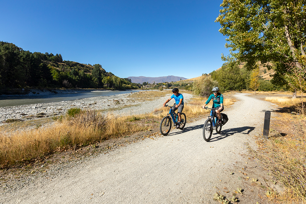 Mountain bikers on the Turkey Beach Trail near Queenstown.